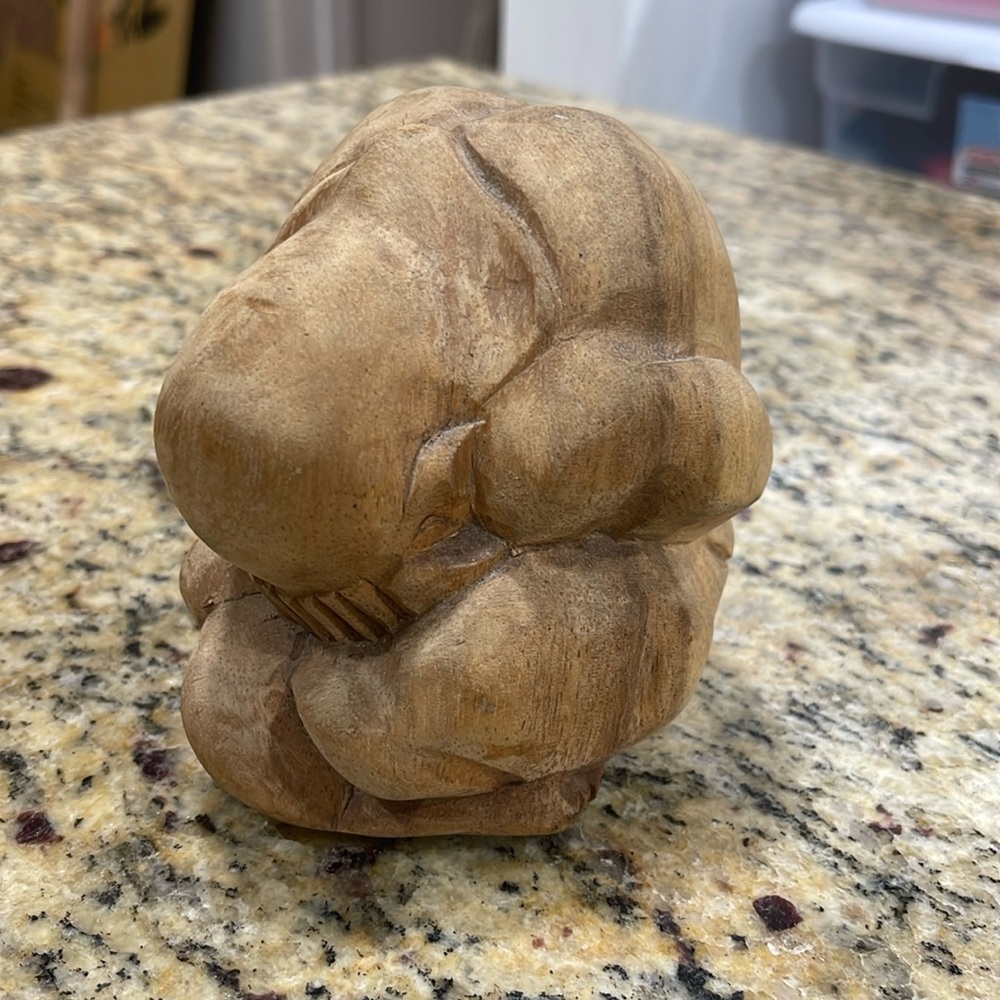Wooden weeping Buddha